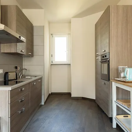 Апартаменты Numero Due Piazza Mazzini - Bymyhomeincomo *